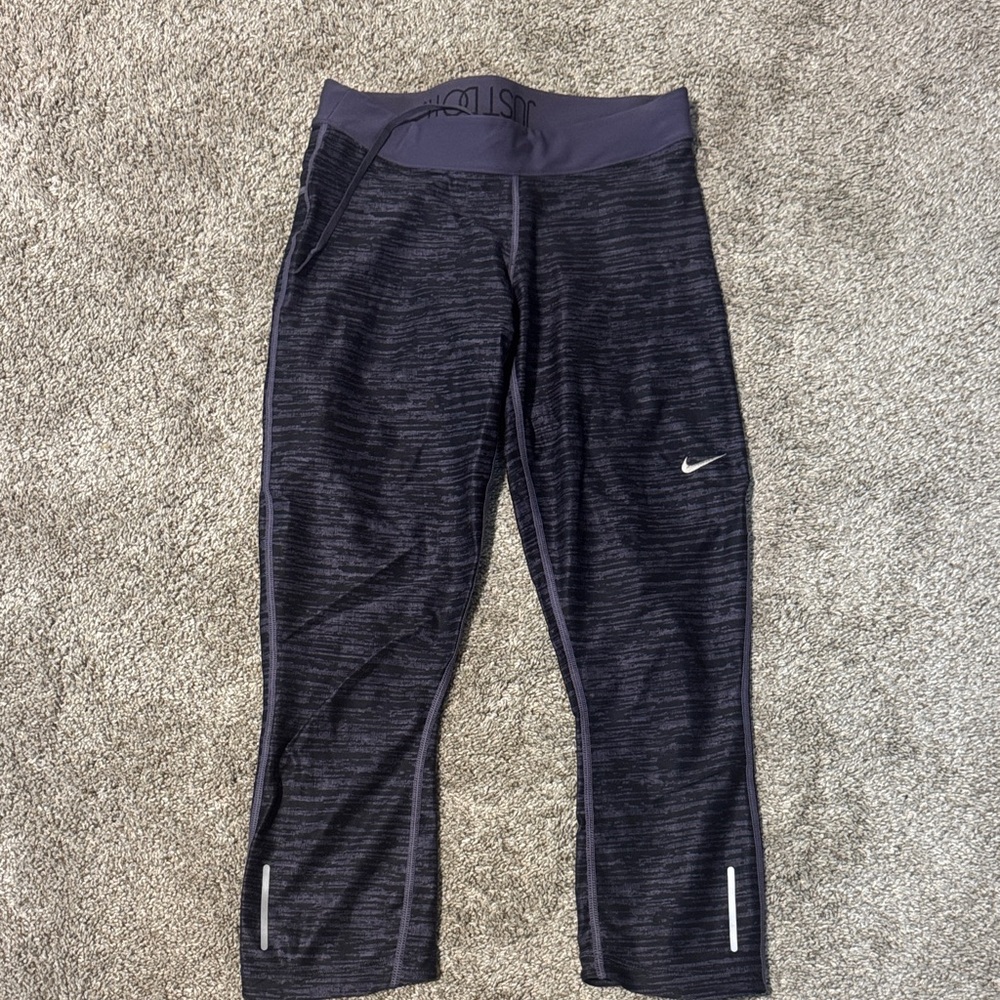 Nike womans black and purple Leggings